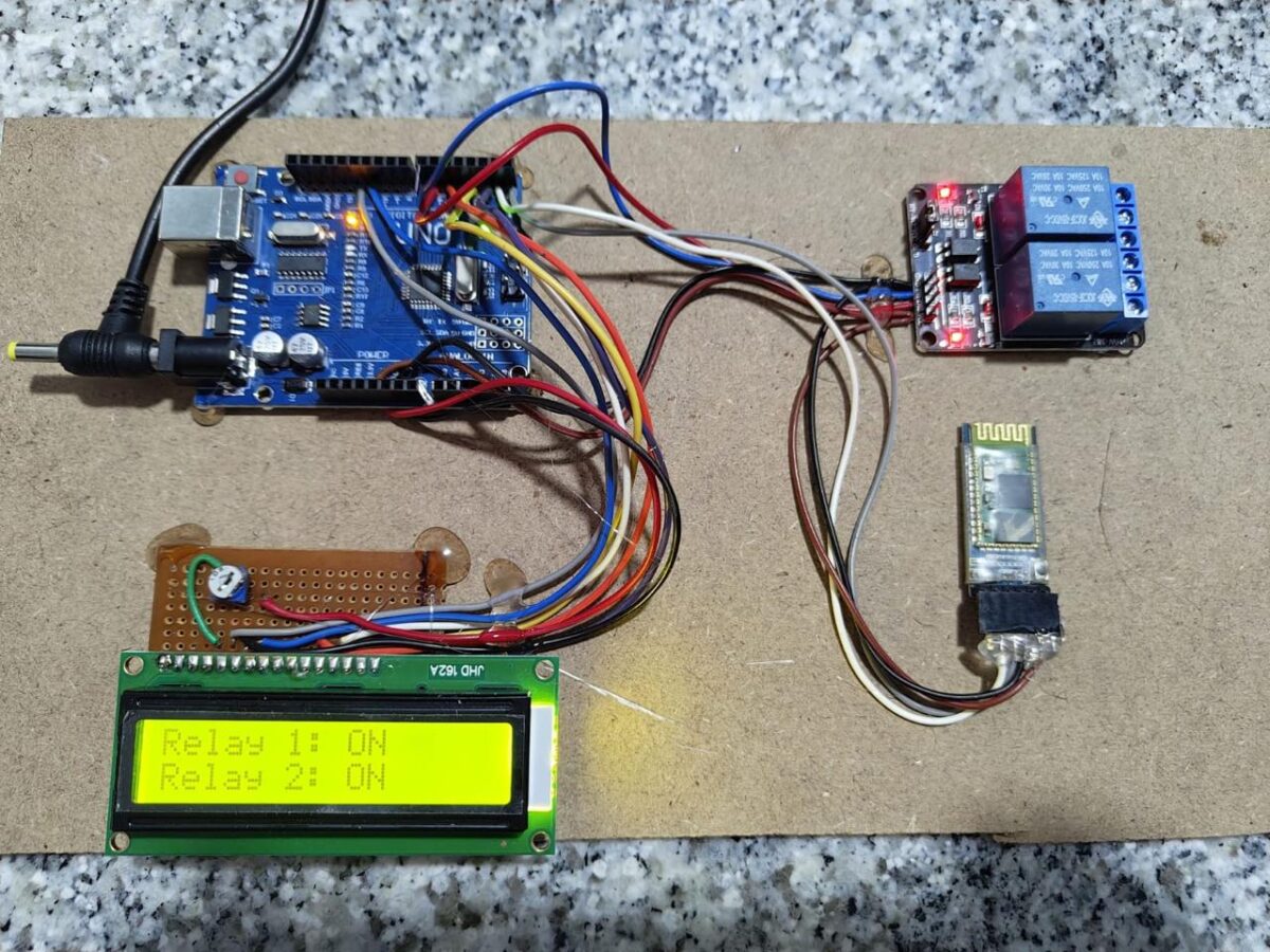 Bluetooth-based home automation project with Arduino Uno, HC-05, relays, and LCD.Bluetooth-Based Home Automation Project